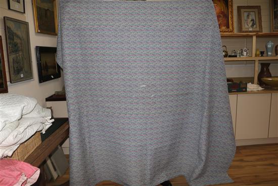 An off-white quilt with blue stitching, a reversible blue and cream quilt, a creamy oyster quilt and a mint green quilt (4)